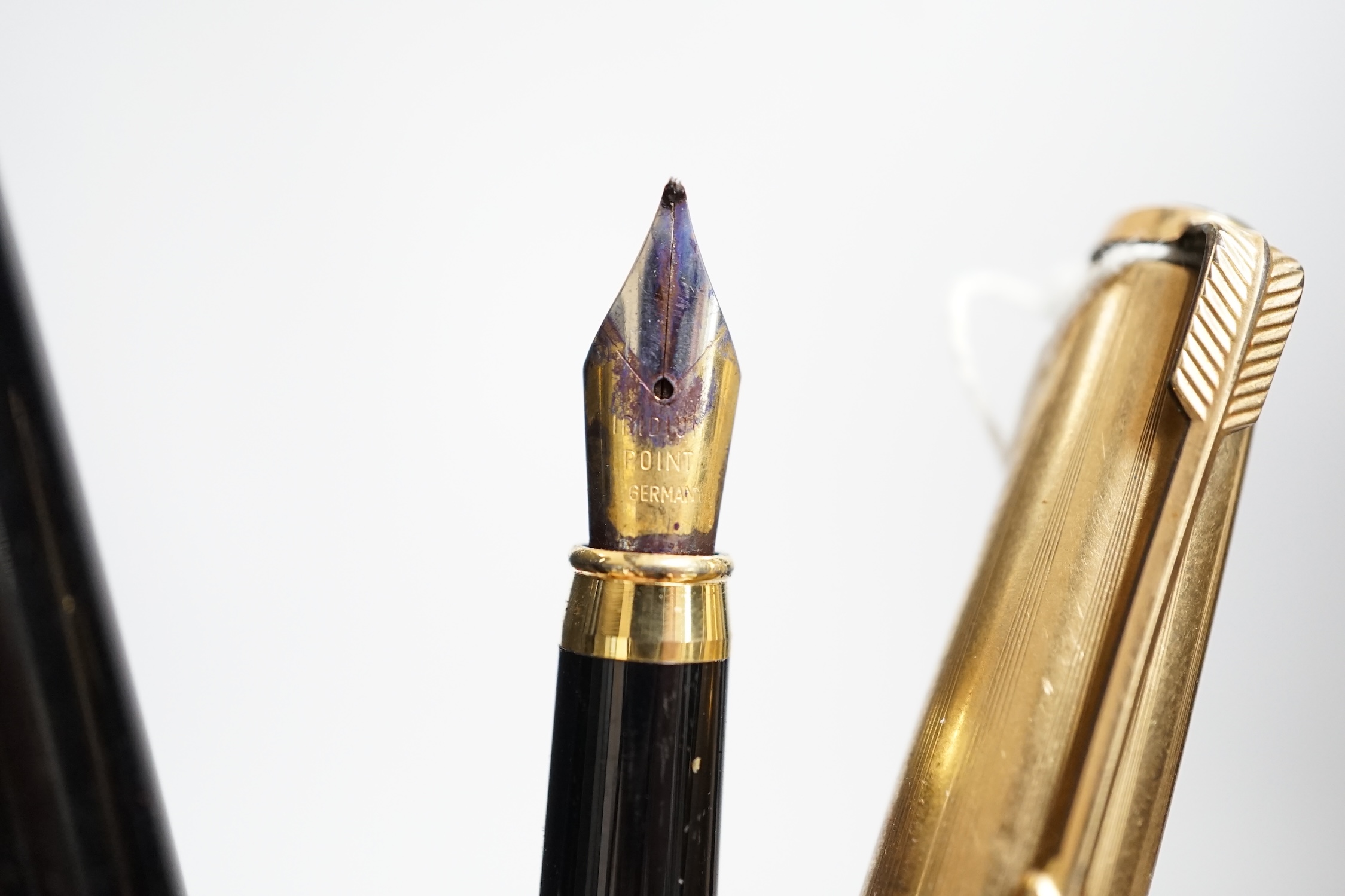 Five various pens including Parker and Reform
